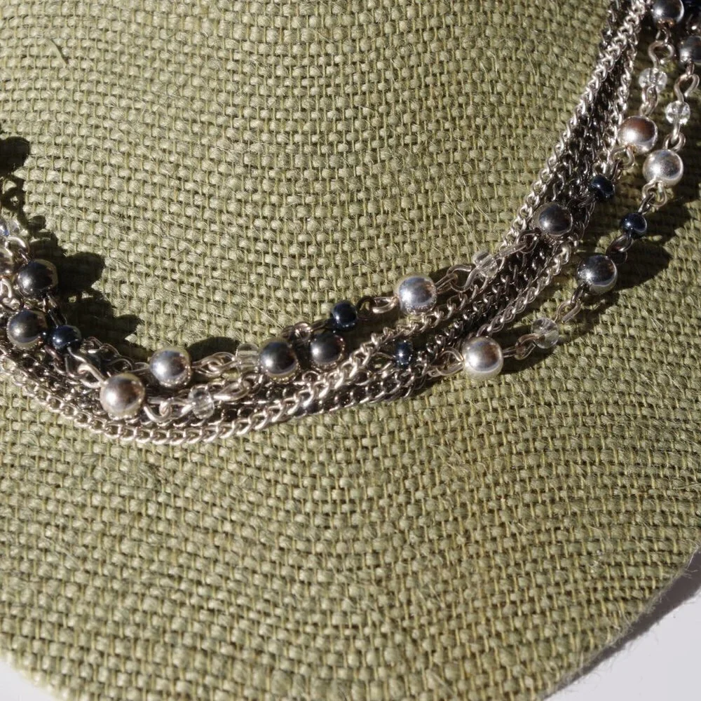 Women`s silver tone bead chain necklace.